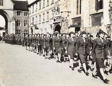 WACs marching in a Wings for Victory Parade at Norwich Cathedral on Sunday 13 May 1945. (Digital archive reference MC 371/049)